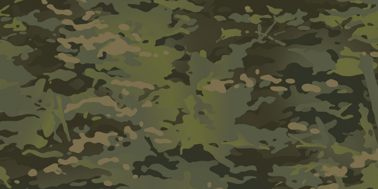 Close-up of green and brown camouflage pattern with nature-inspired shapes
