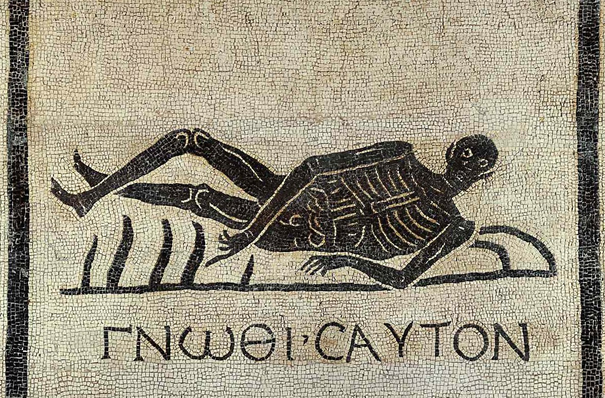 Ancient Roman mosaic of a reclining skeleton with Greek inscription, symbolic art detail