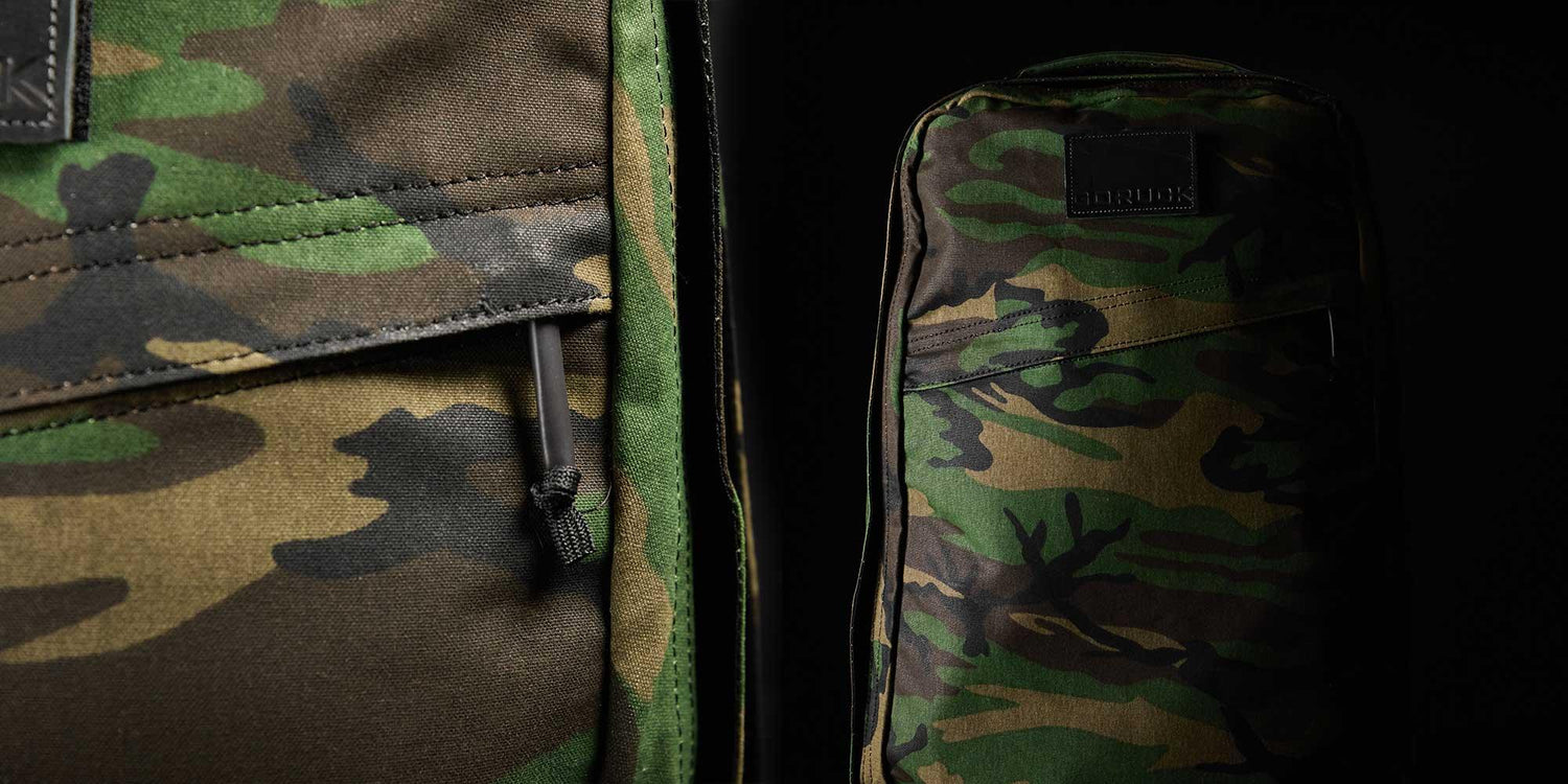 GORUCK camo rucksack and gear in close-up with rugged, military-style fabric detail