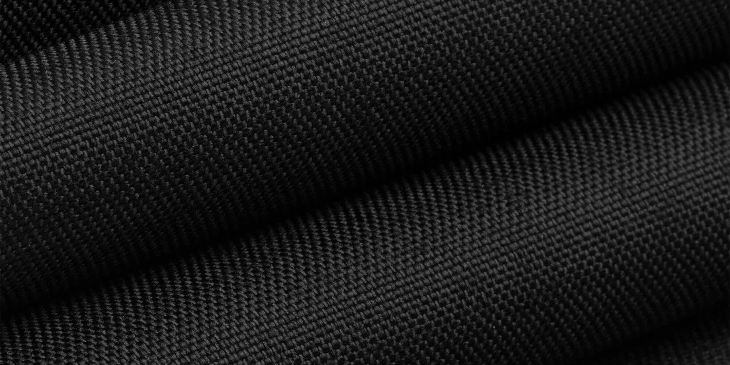 Close-up of black Cordura fabric texture used in GORUCK rucking gear
