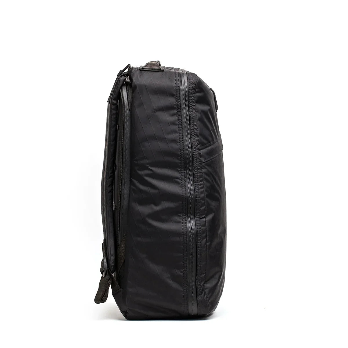 Side view of black GORUCK tough, water-resistant rucking backpack with durable fabric and zipper detailing