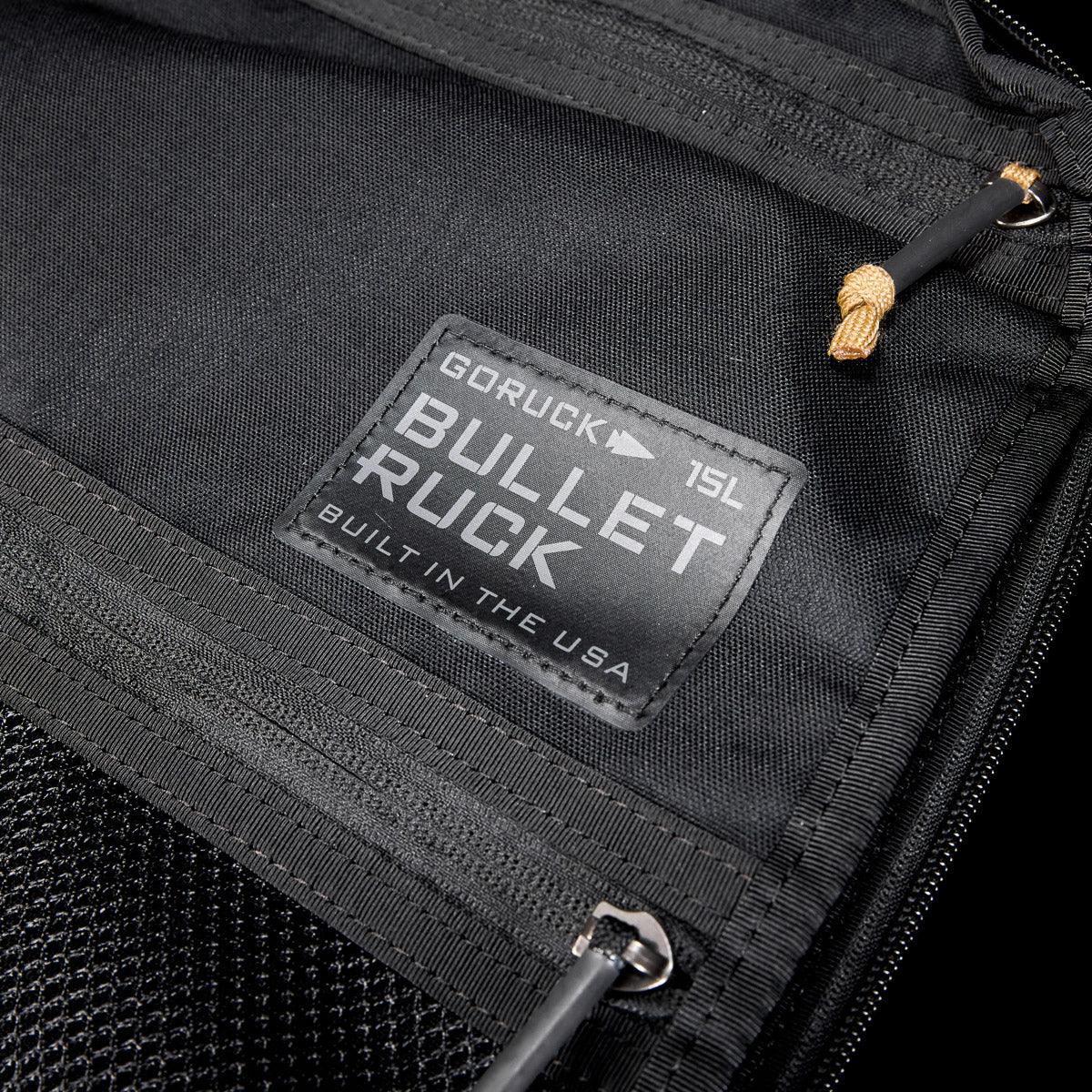 Close-up of black GORUCK Bullet 15L rucksack interior with label and zipper detail