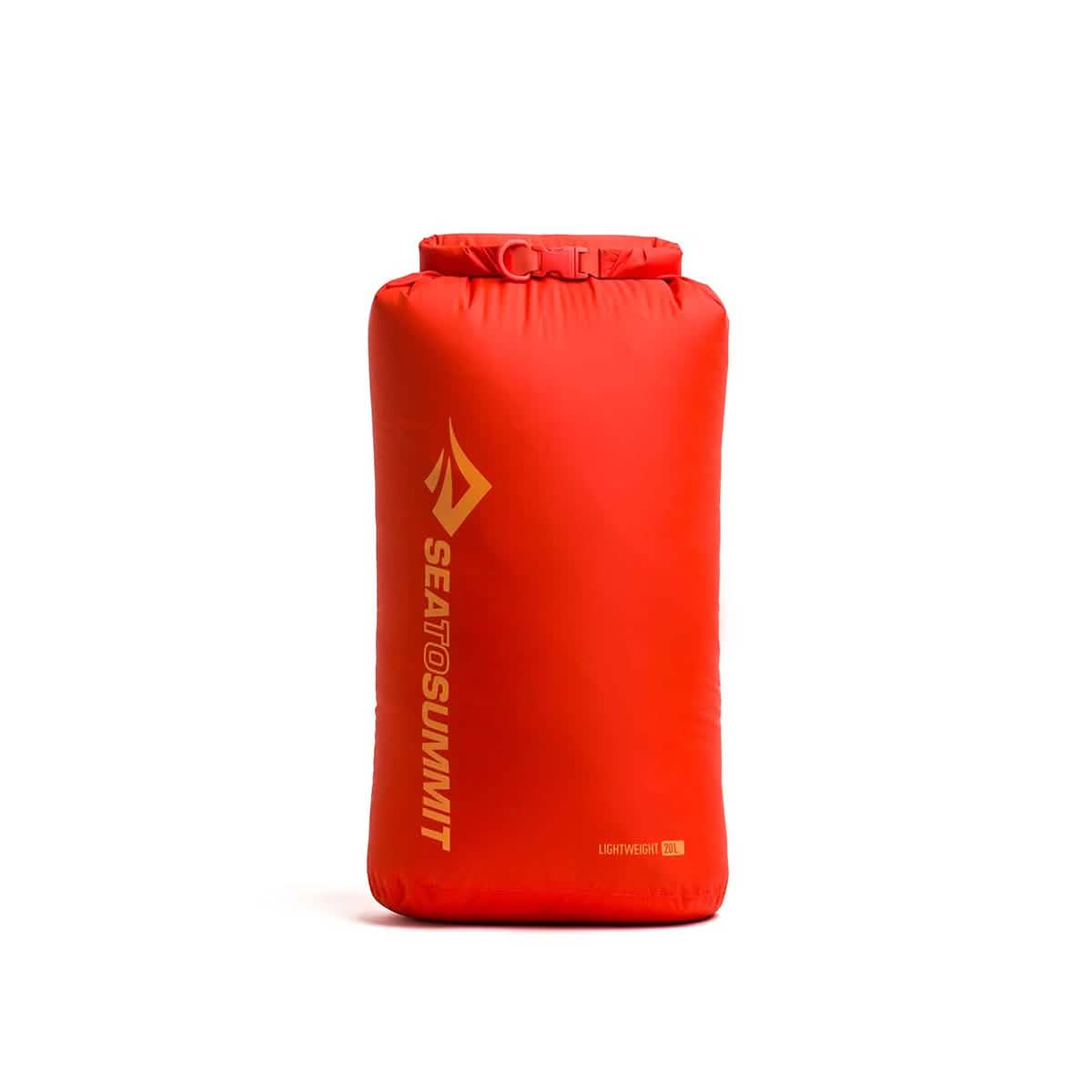 A red Sea to Summit Dry Sack, crafted from durable nylon, displays the brand logo and name in gold. It includes a waterproof roll-top closure and stands upright to emphasize its cylindrical shape.