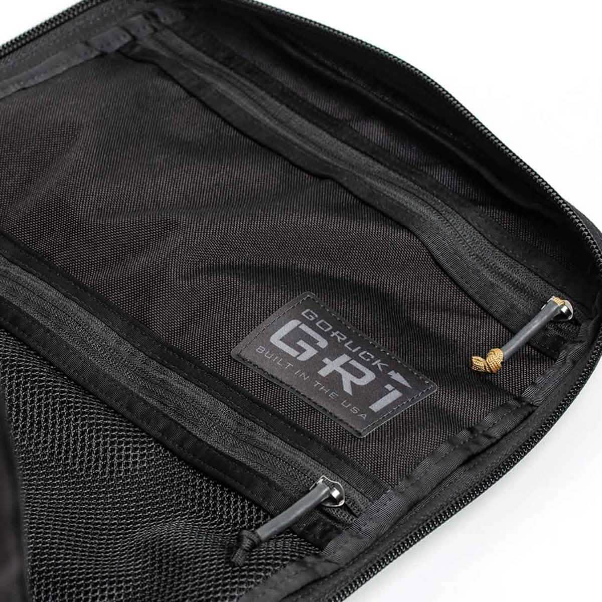 The GR1 USA - Cordura (The Original Ruck) from GORUCK in black features interior pockets and zippers, proudly displaying its