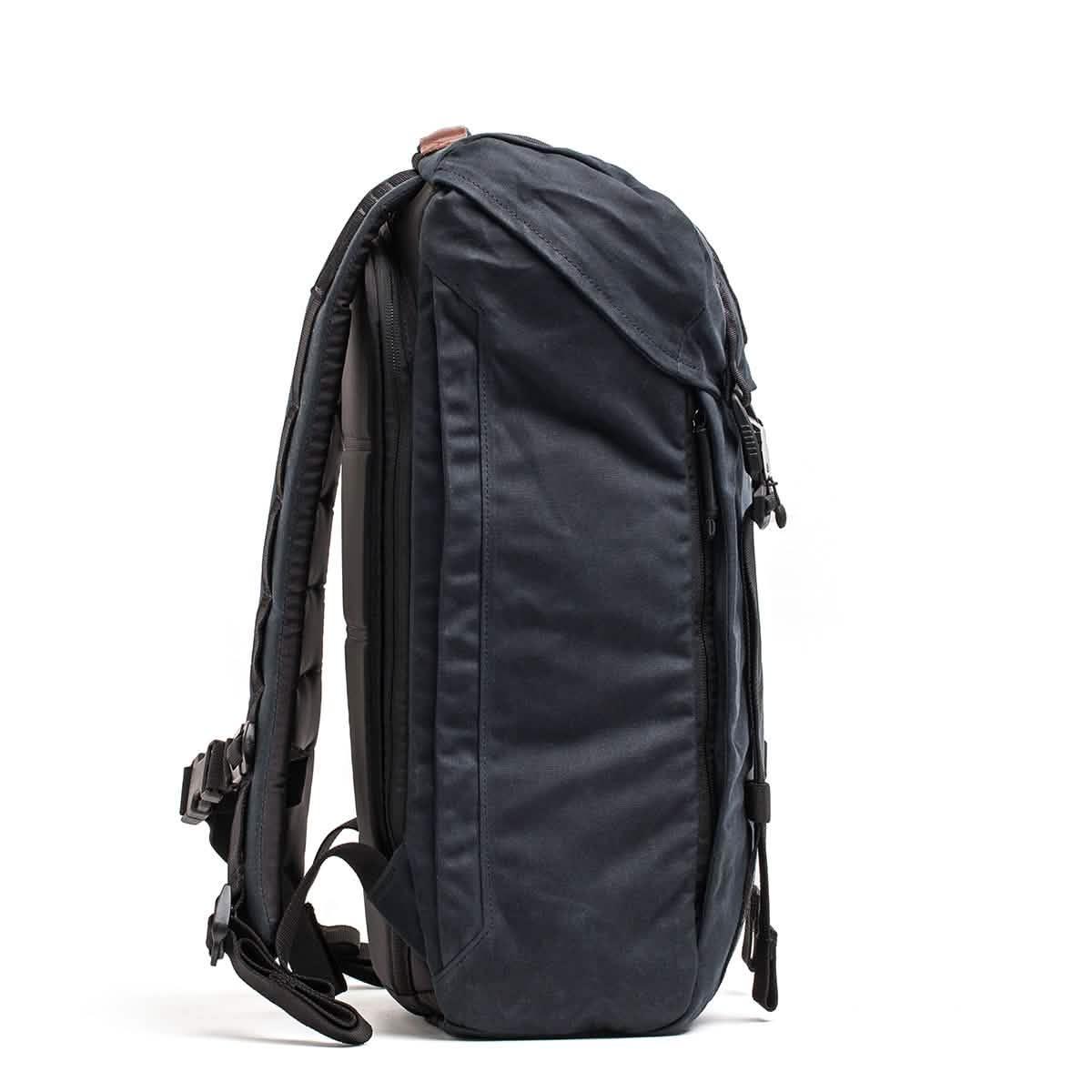 Side view of durable black GORUCK rucking backpack with padded straps and secure zippers