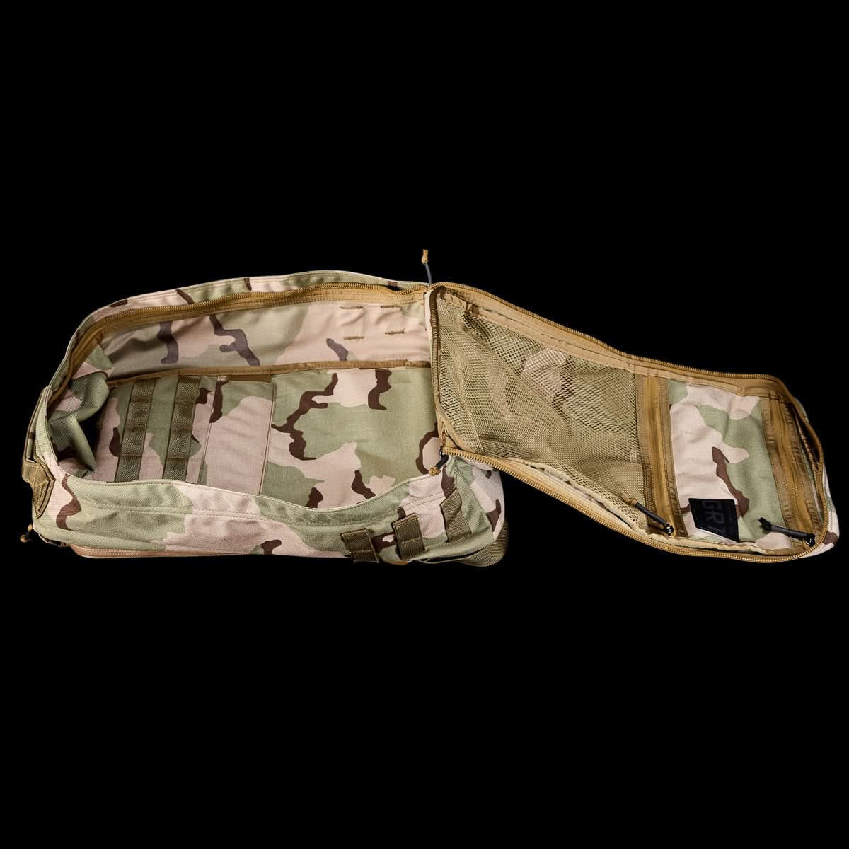 Open GR1 USA - Ballistic Nylon Cordura (The Original Ruck) 210D Back Panel duffel with mesh lid pockets, reminiscent of Special Forces gear, displayed on a black background.