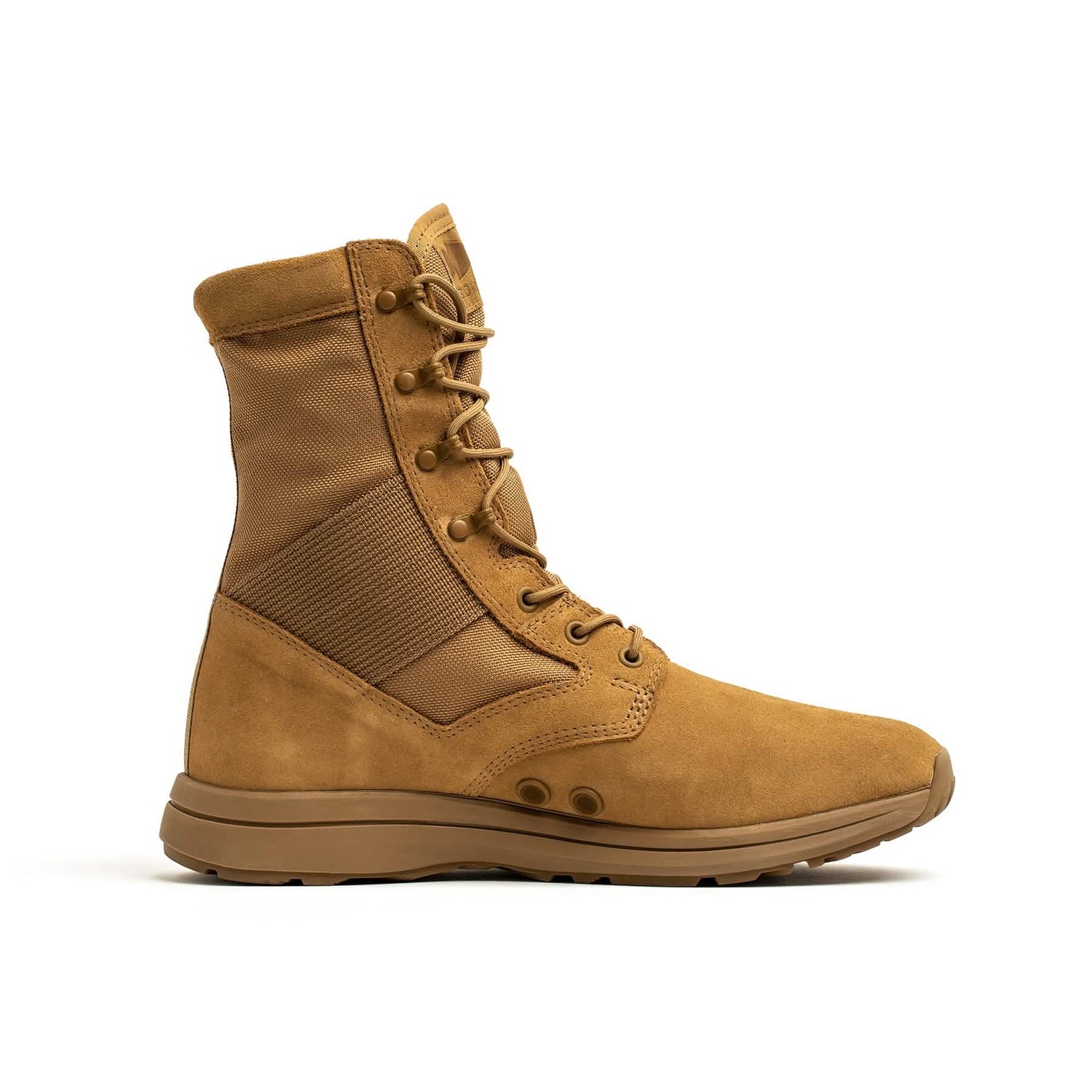 The MACV-1 Hi-Speed - High Top by GORUCK is a tan military-style boot with a high ankle and lace-up design, ideal for lightweight rucking. It showcases a textured side panel and a sturdy sole, all captured against a white background.
