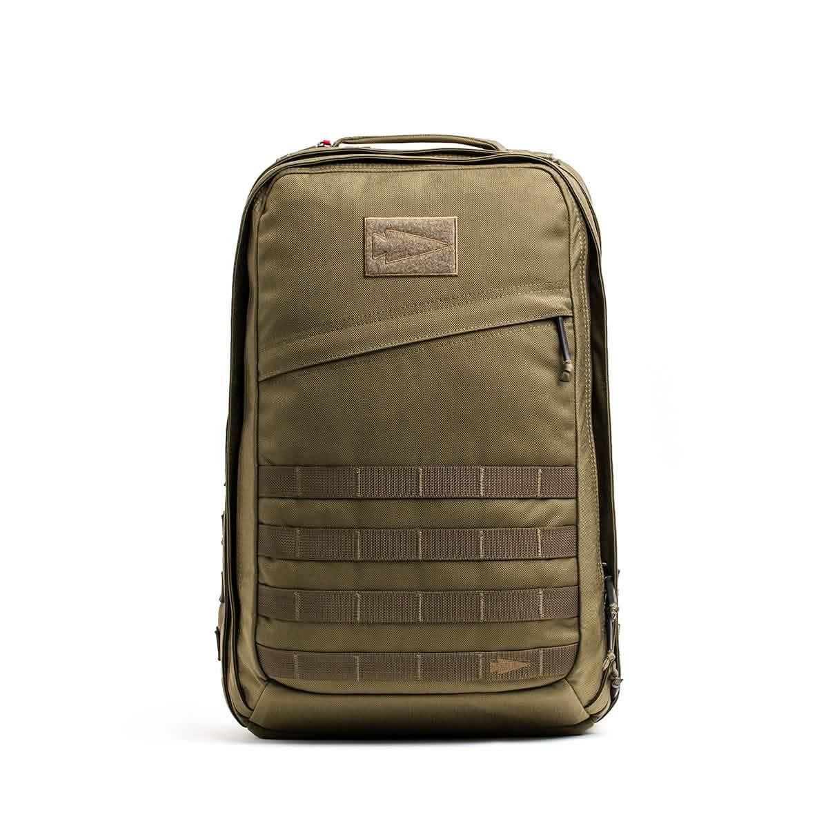 GORUCK tough olive green tactical backpack with front MOLLE straps and angled zippered pocket