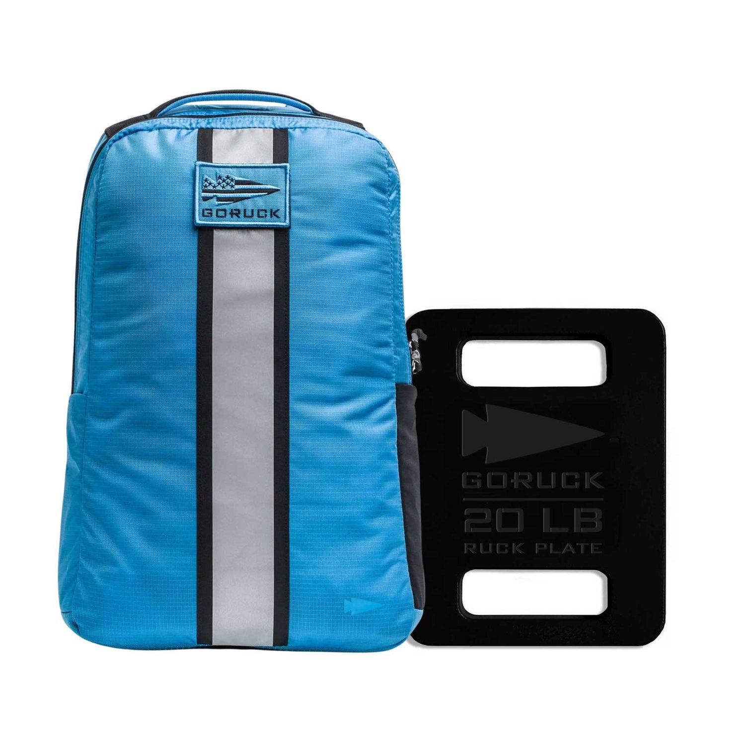A blue Basic Rucker backpack stands next to a black 20-pound ruck plate, included for free—perfect for rucking and weighted training sessions.