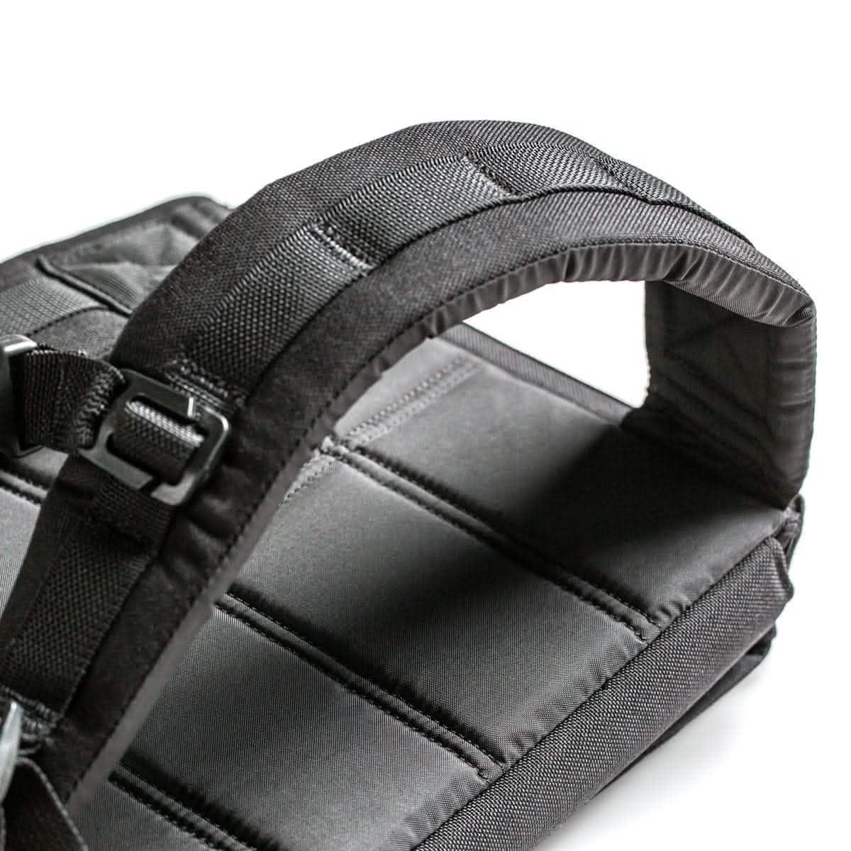 Close-up of black padded GORUCK 45lb ruck plate carrier straps with durable nylon stitching