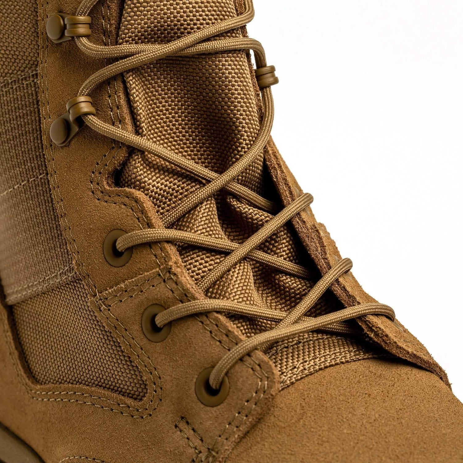 Close-up of tan GORUCK rucking boot with durable nylon and suede, tactical laces visible