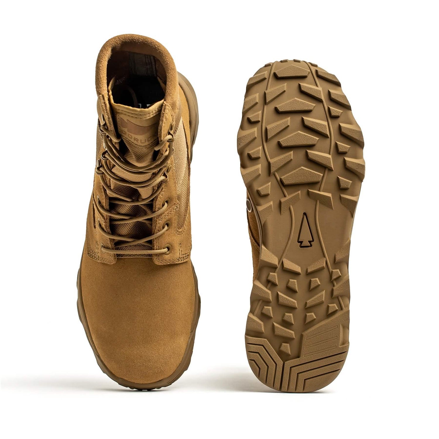 A pair of GORUCK's MACV-2 - High Top boots in coyote brown. One boot stands upright, showcasing its laces and leather exterior, while the other is tilted to reveal a rugged triple compound outsole designed for any terrain.