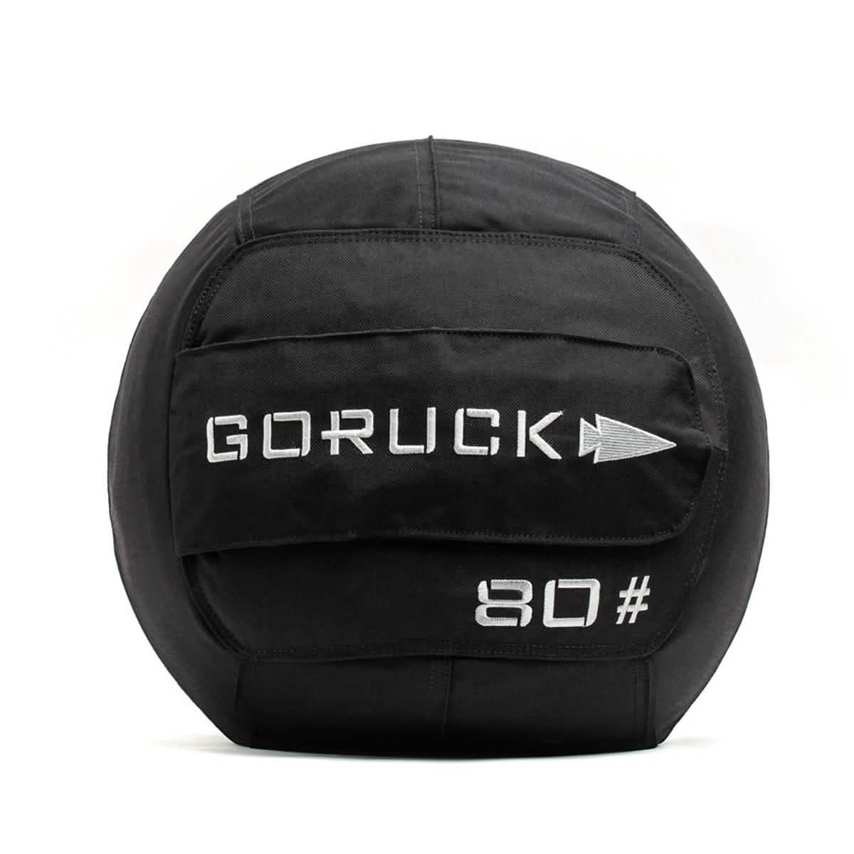Black GORUCK weighted sandbag with 80-pound marking used for rucking and strength training