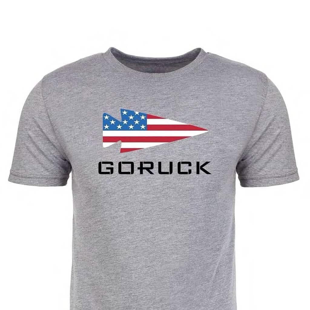 GORUCK grey t-shirt with American flag arrowhead logo and bold GORUCK text on chest