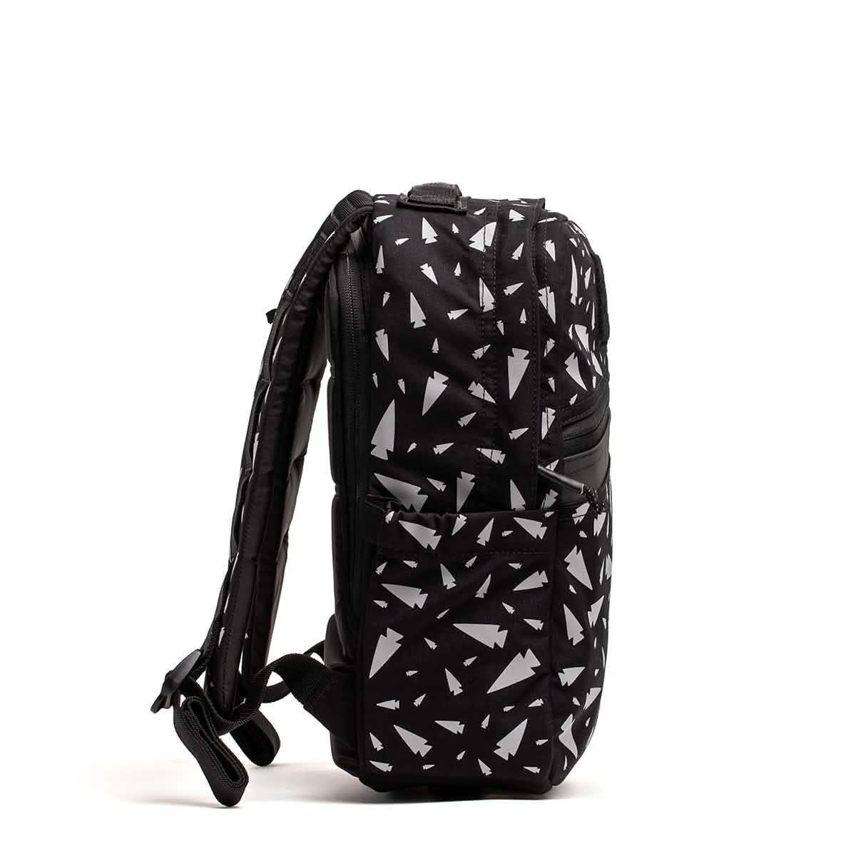 REFLECTIVE KR1 black school backpack with white geometric patterns, shown from the side against a plain white background—a durable book bag ideal for everyday use.