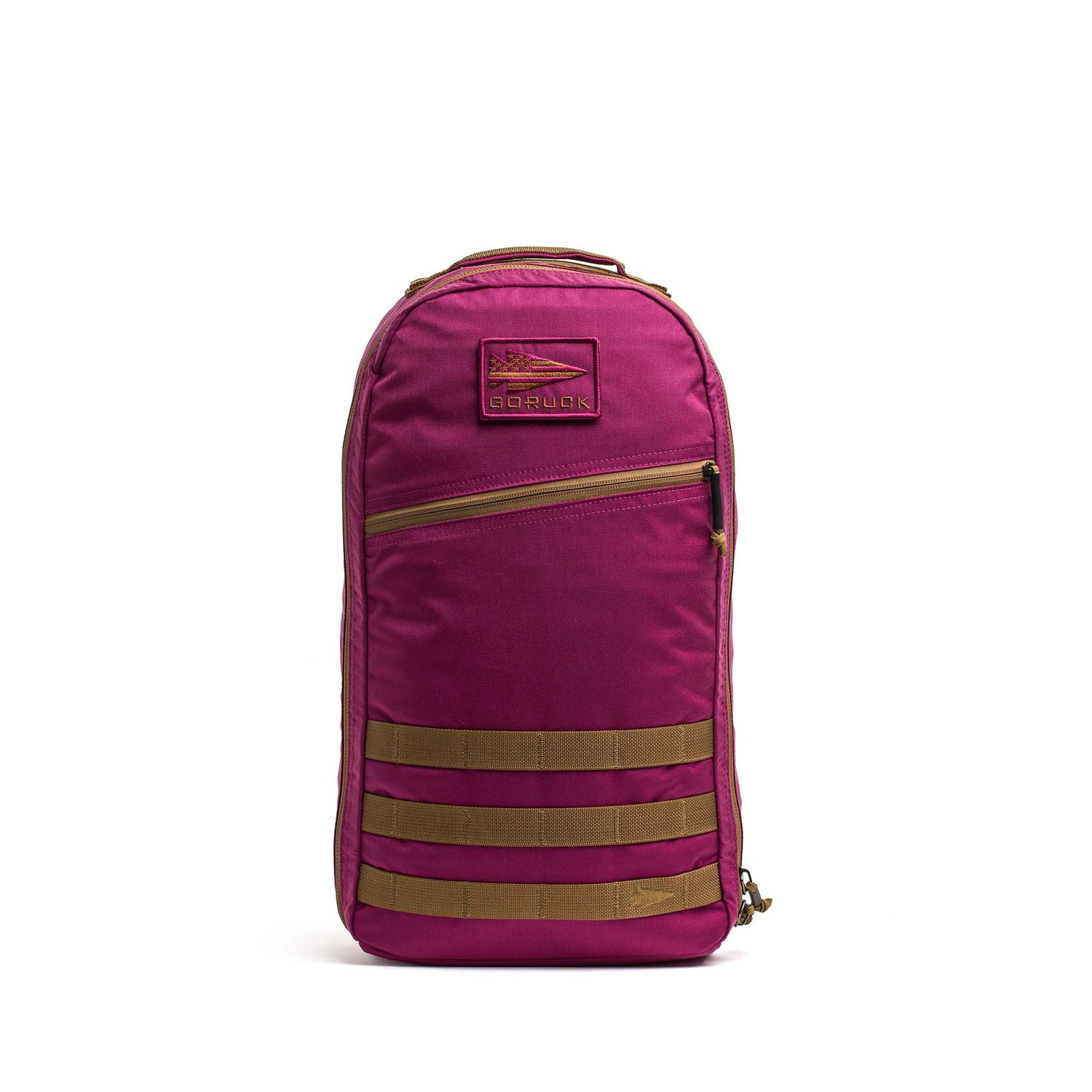 The Bullet Ruck Classic - Ballistic Nylon Cordura in magenta features tan straps and a front zip pocket, shown standing upright on a white background.