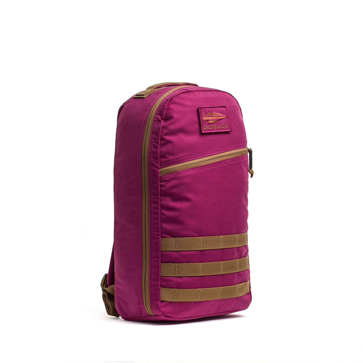 The Bullet Ruck Classic - Ballistic Nylon Cordura is a magenta 15L daypack with tan straps and a patch logo, pictured standing upright on a white background.