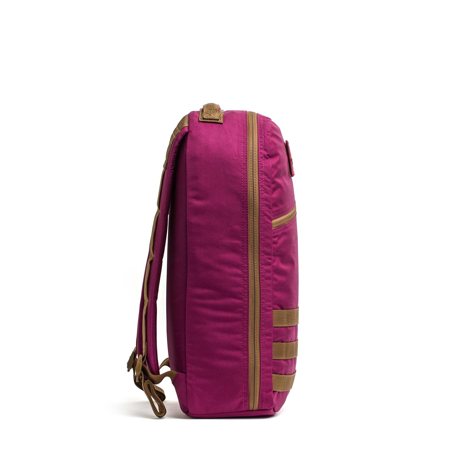 Side view of the Bullet Ruck Classic - Ballistic Nylon Cordura backpack in magenta with tan straps and zippers, standing upright on a white background.
