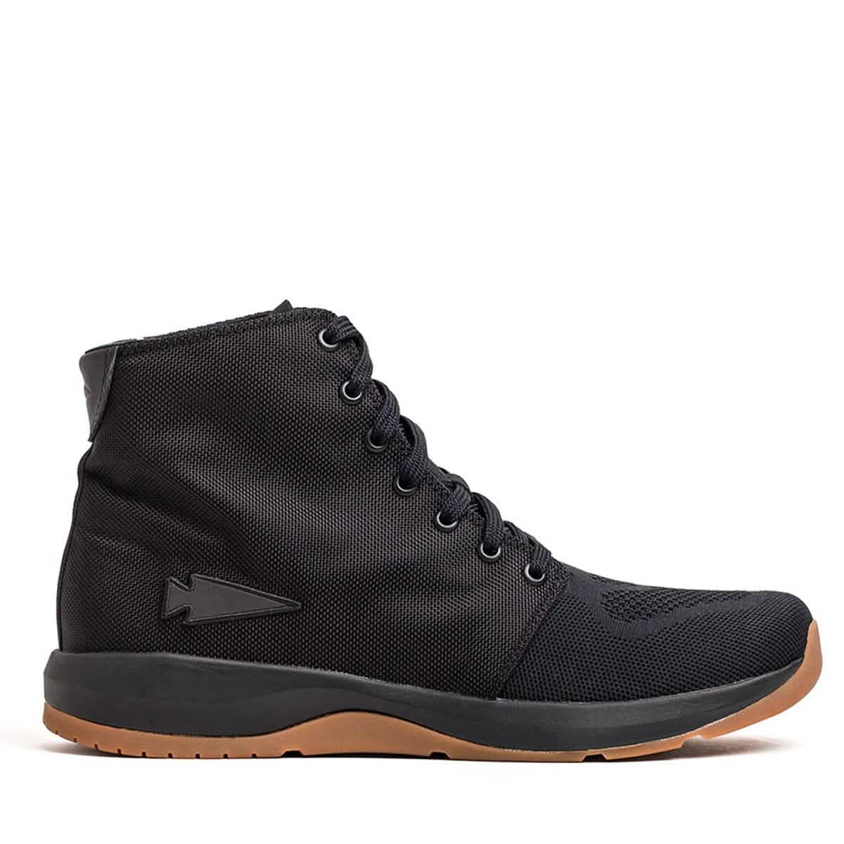 Side view of GORUCK Ballistic Trainer Mid shoe in black with gum sole and reflective spearhead logo