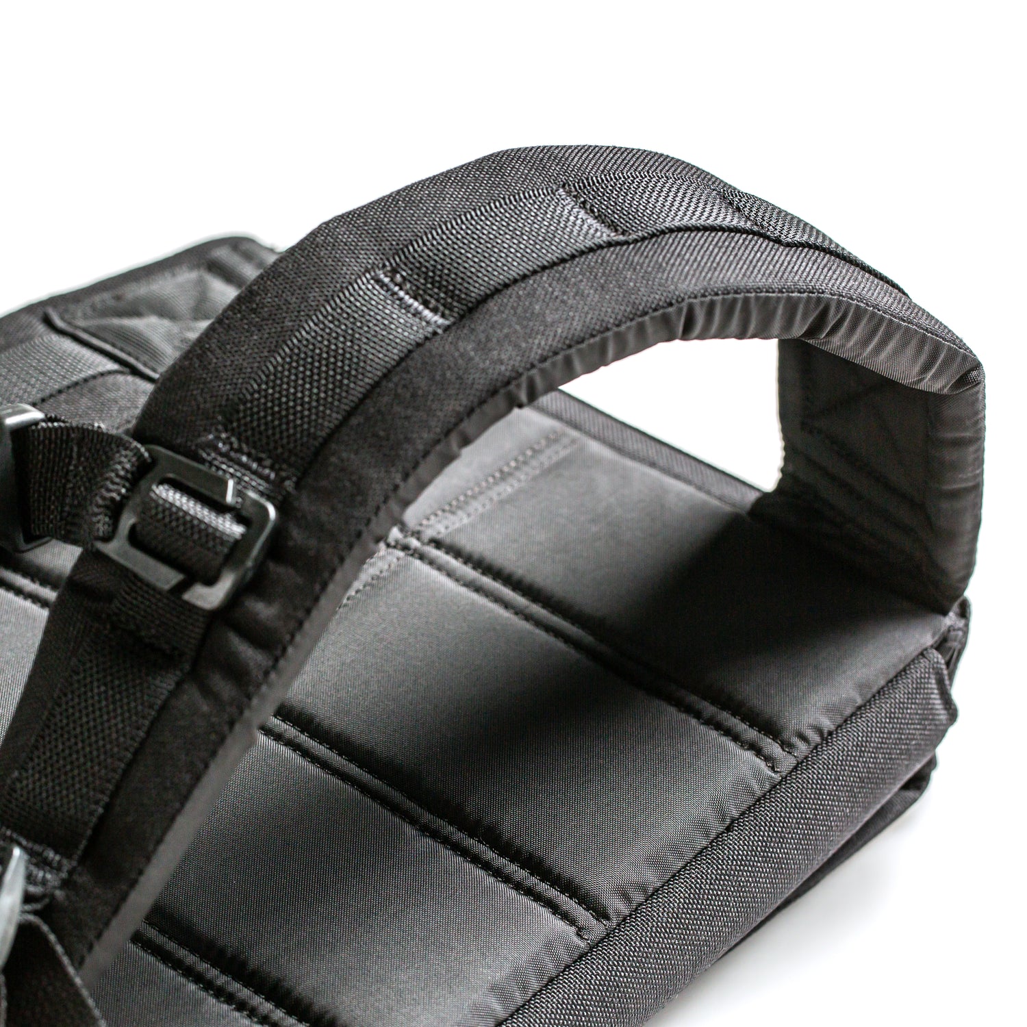 Close-up of the padded handle with stitching and metal buckle on the RPC Long + 30LB (Long) Plate Bundle, shown against a white background.