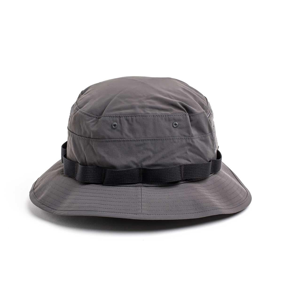 GORUCK gray boonie hat with black strap and ventilation eyelets on white background