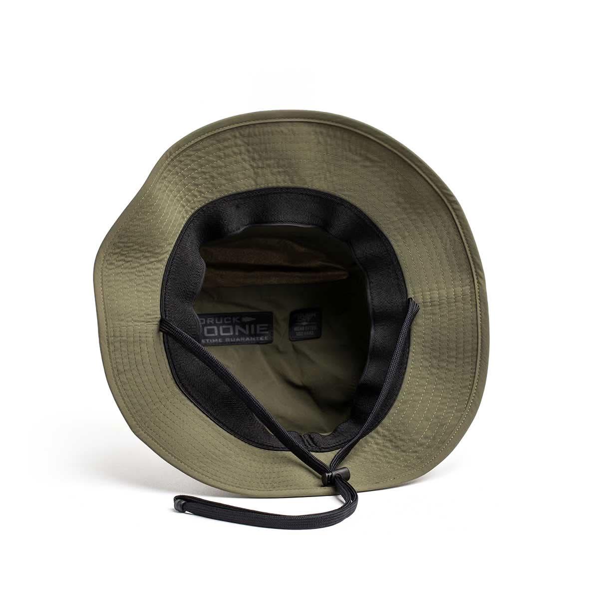 Top view of olive green GORUCK Boonie hat with black adjustable chin strap and interior label
