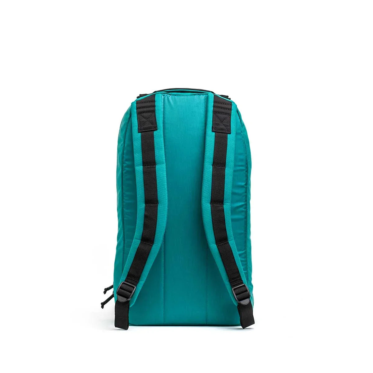 Teal GORUCK Bullet 15L backpack with black padded shoulder straps, rear view on white background