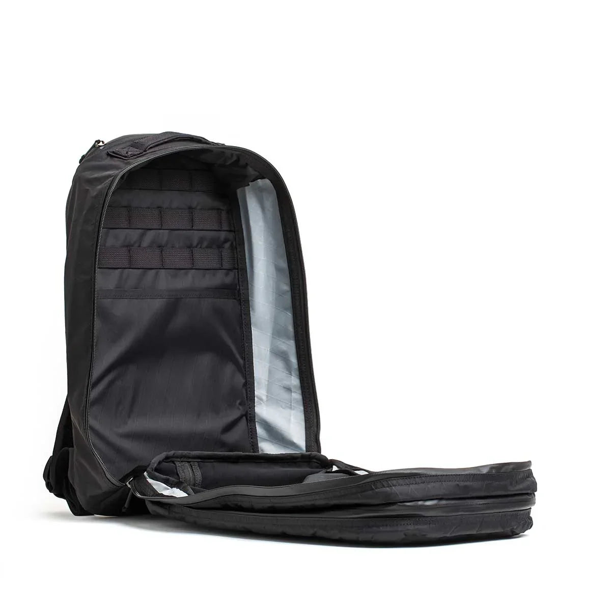 GORUCK Bullet 16L black rucksack open, showing two compartments and laptop sleeve