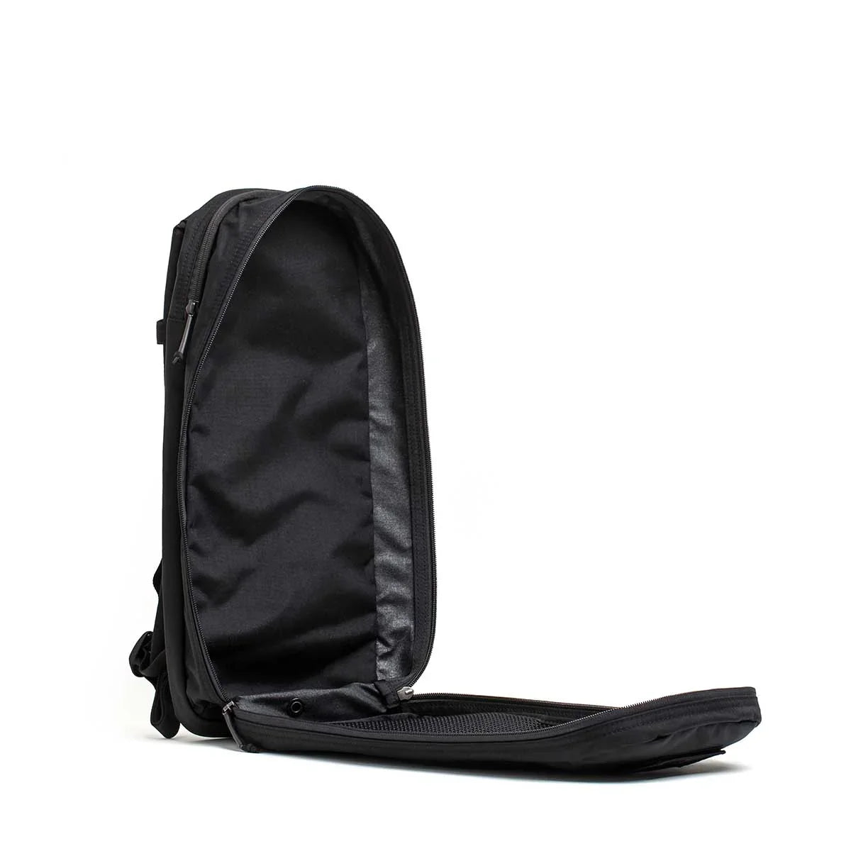 Open black GORUCK Bullet Ruck 10L backpack showing spacious interior and durable construction