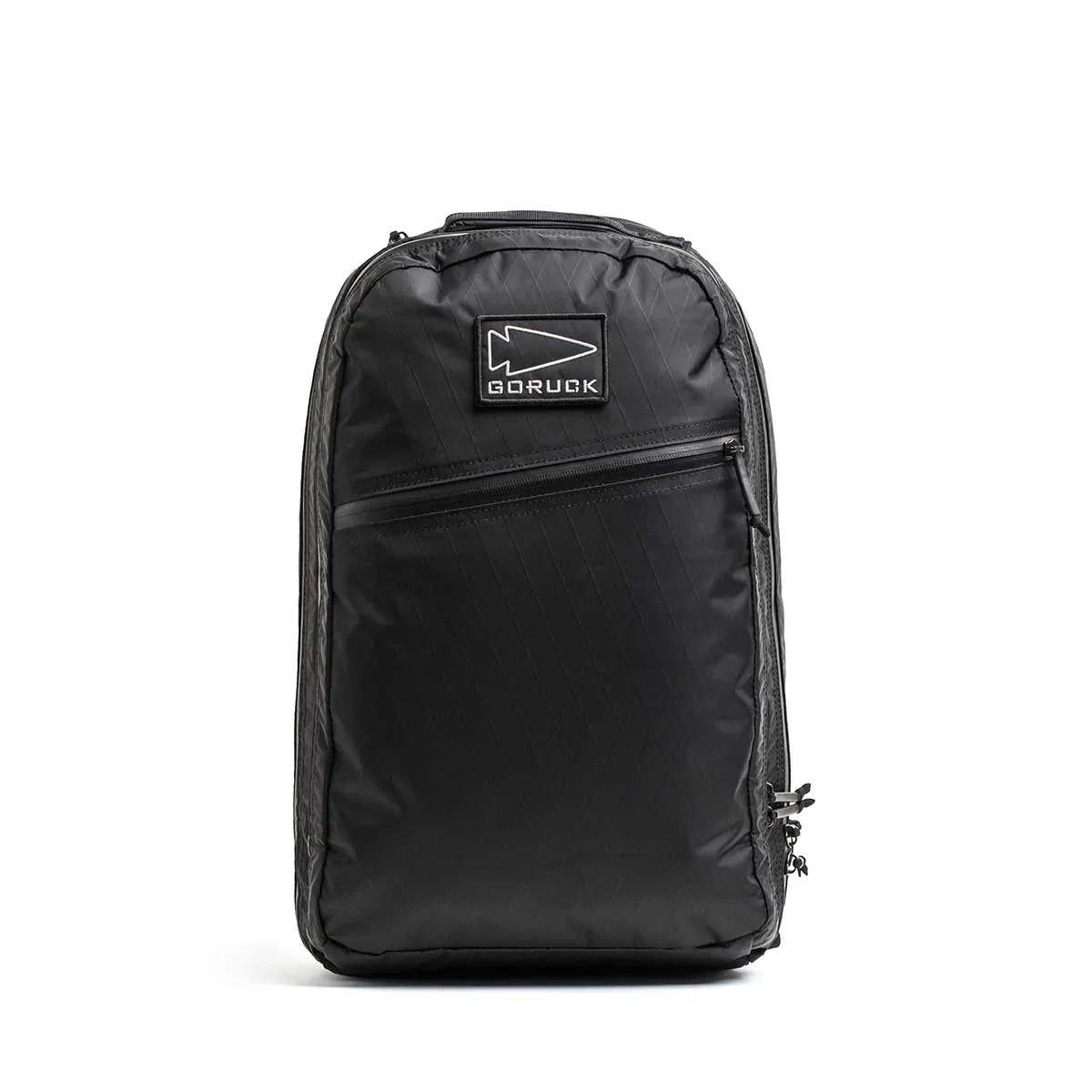 GORUCK Bullet 18L black rucksack with front zipper pocket and logo patch, studio view