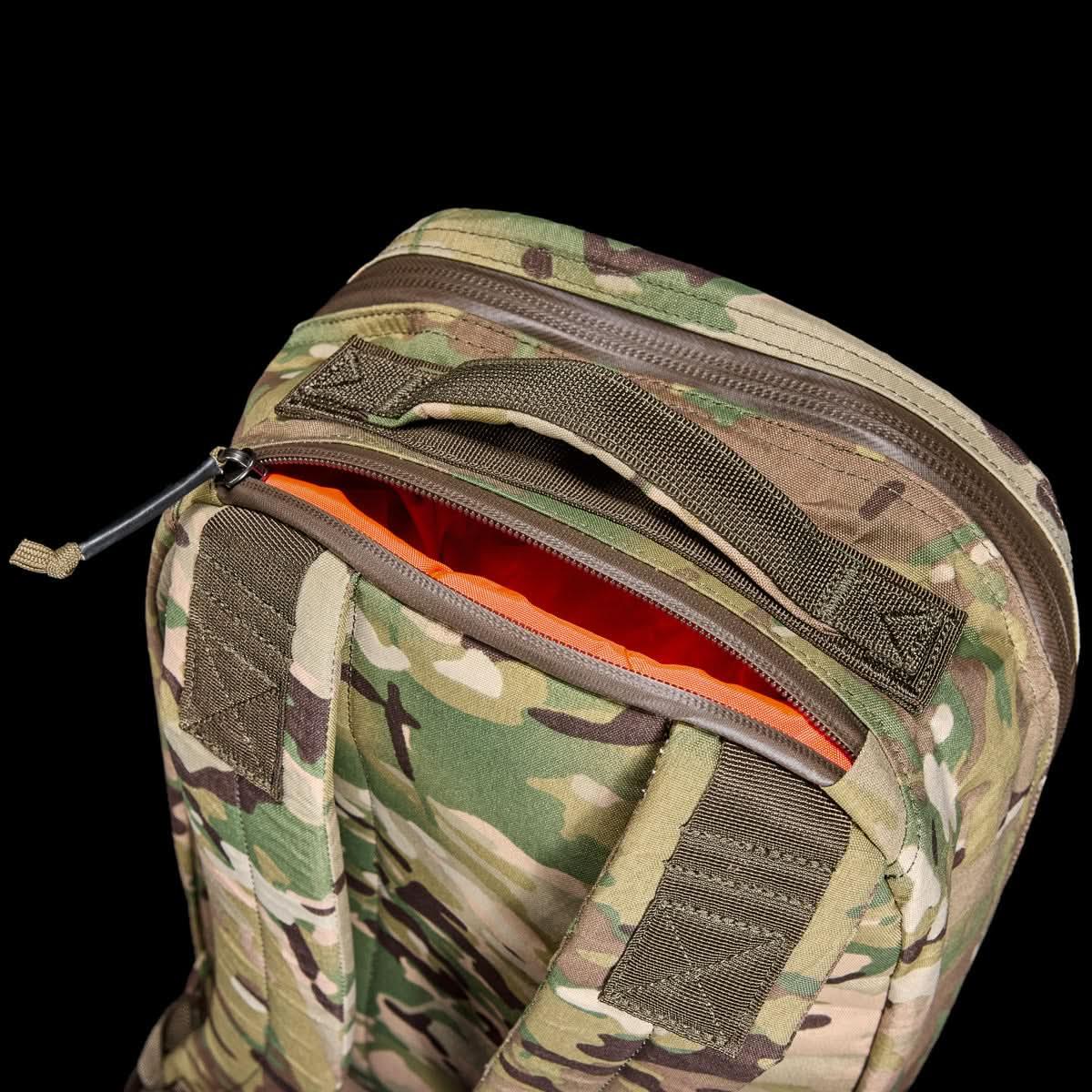 GORUCK 15L Bullet Xpac Multicam backpack with open zipper and orange interior on black background