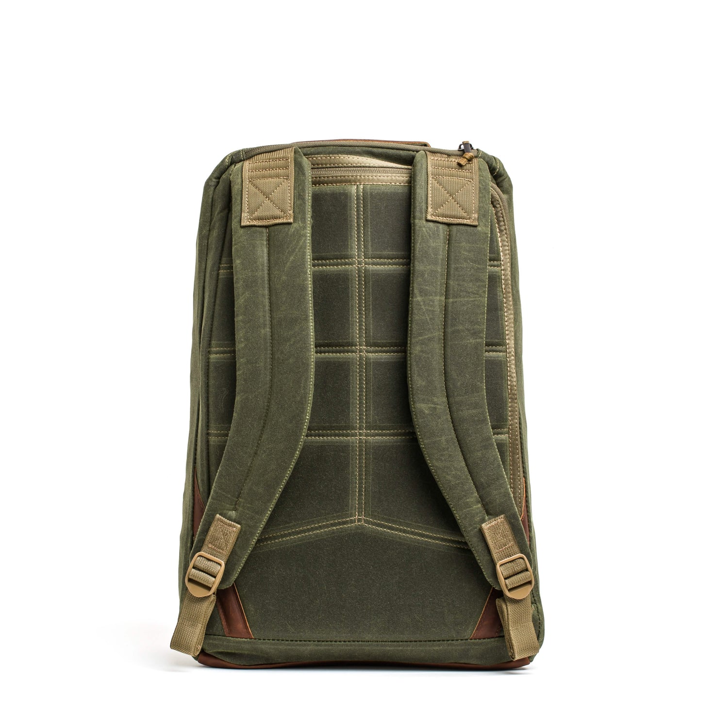 A GR1 USA - Heritage backpack by GORUCK is displayed from the back, highlighting padded shoulder straps, brown leather accents, and a grid stitch pattern. Made with waxed duck canvas, the adjustable straps complement its simple and rugged design.