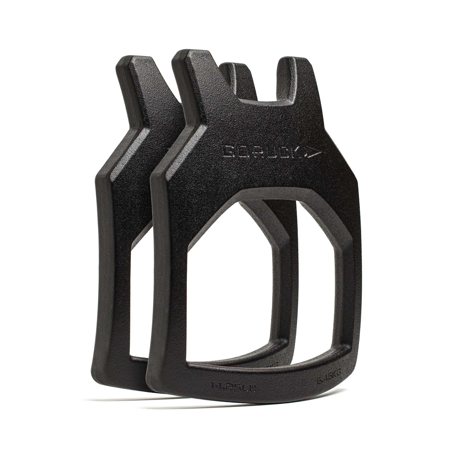 Two black, angular metal Curved Ruck Plates stand upright and partially overlap, featuring embossed text on the surface.