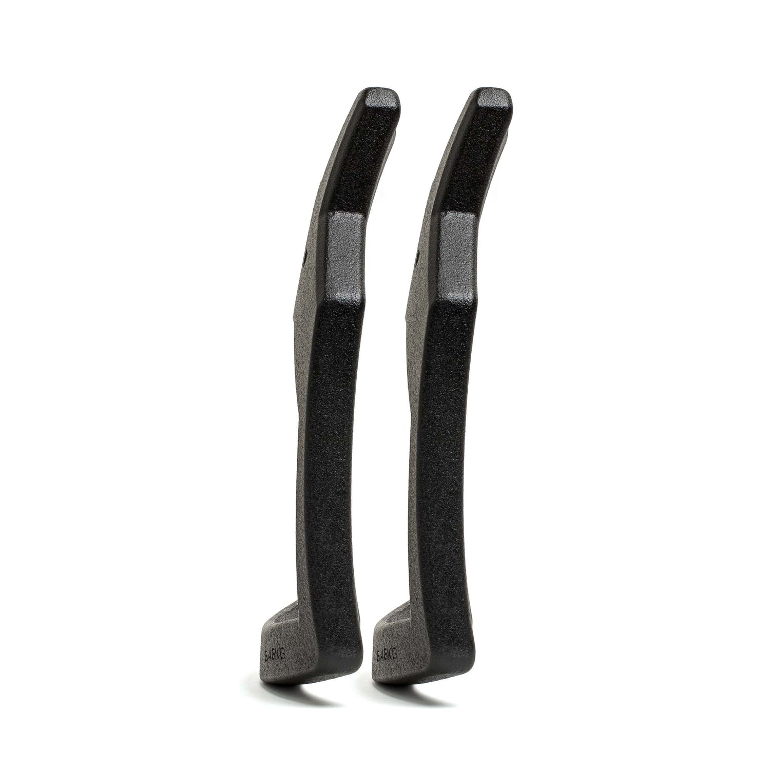 Two black plastic tire levers stand upright side by side on a white background—an essential tool for cyclists, just as Curved Ruck Plates are indispensable for anyone training with a rucking weight vest.