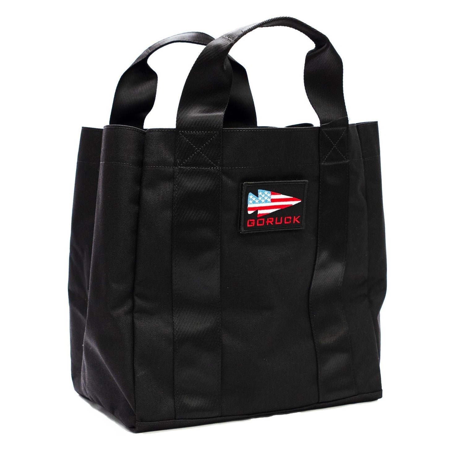Black GORUCK tactical tote bag with American flag arrow patch and dual handles