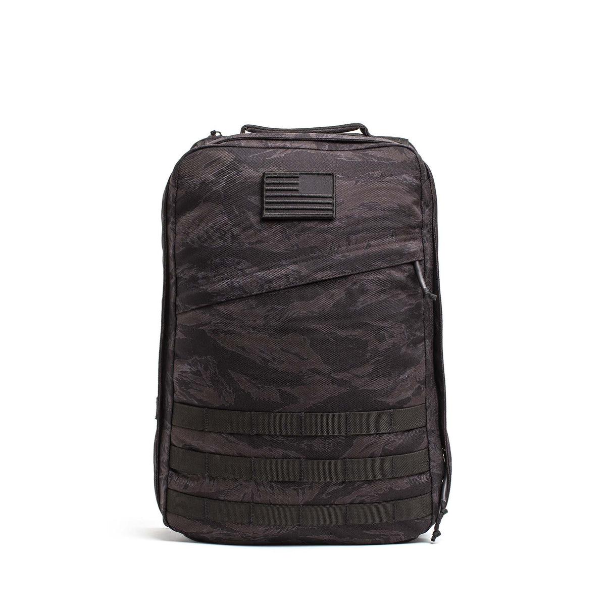 The GR1 USA – Cordura is a black camo everyday rucksack with an American flag patch and multiple lower front straps, built to Special Forces grade standards.