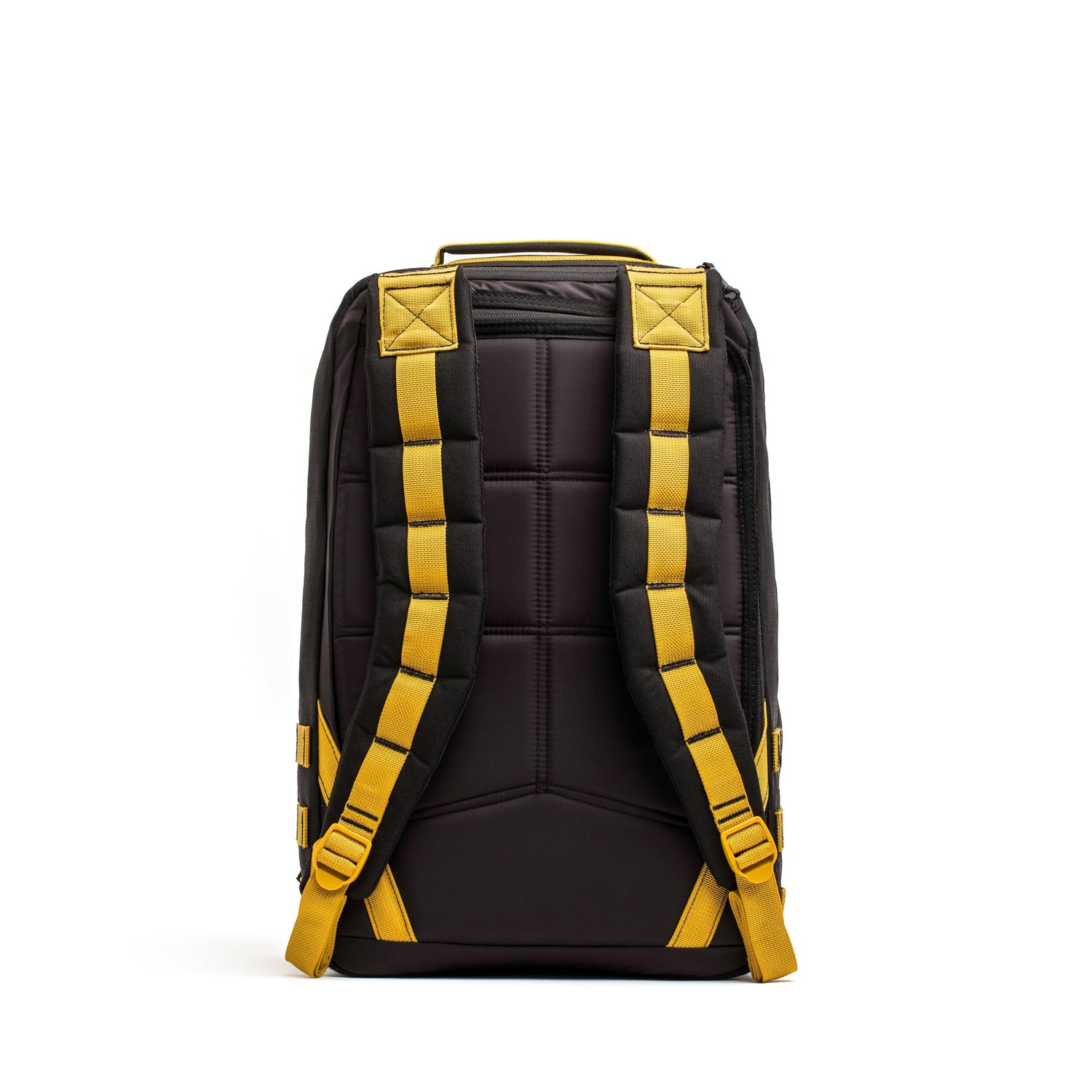Back view of GORUCK black rucksack with padded yellow and black straps on white background