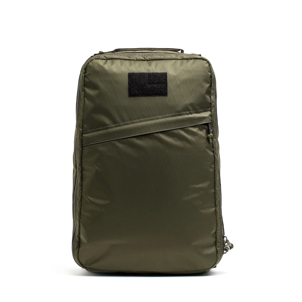 GORUCK dark green tactical rucksack with zippered front pocket and Velcro patch on white background