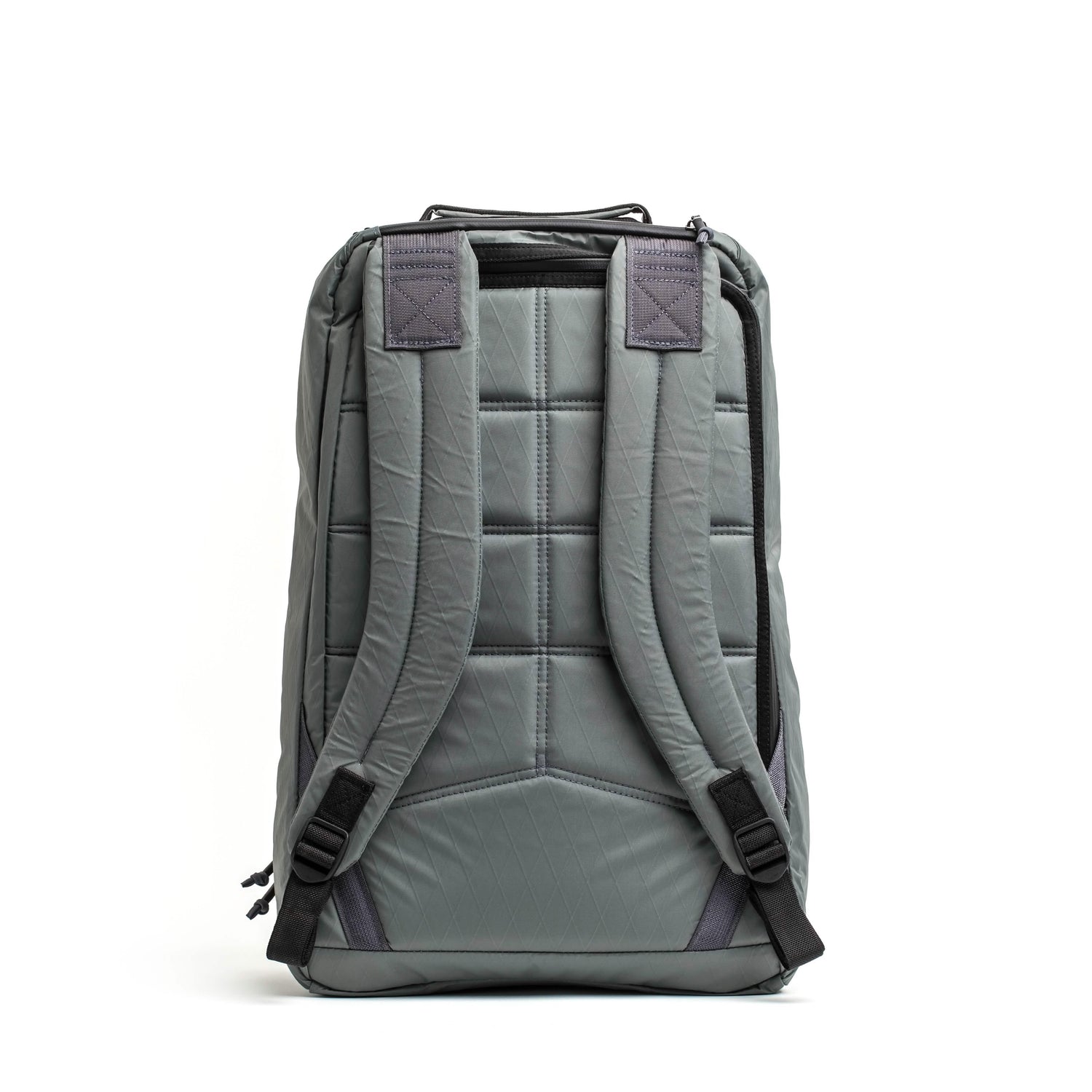 Back view of charcoal gray rugged GORUCK rucksack with padded adjustable shoulder straps and quilted back panel