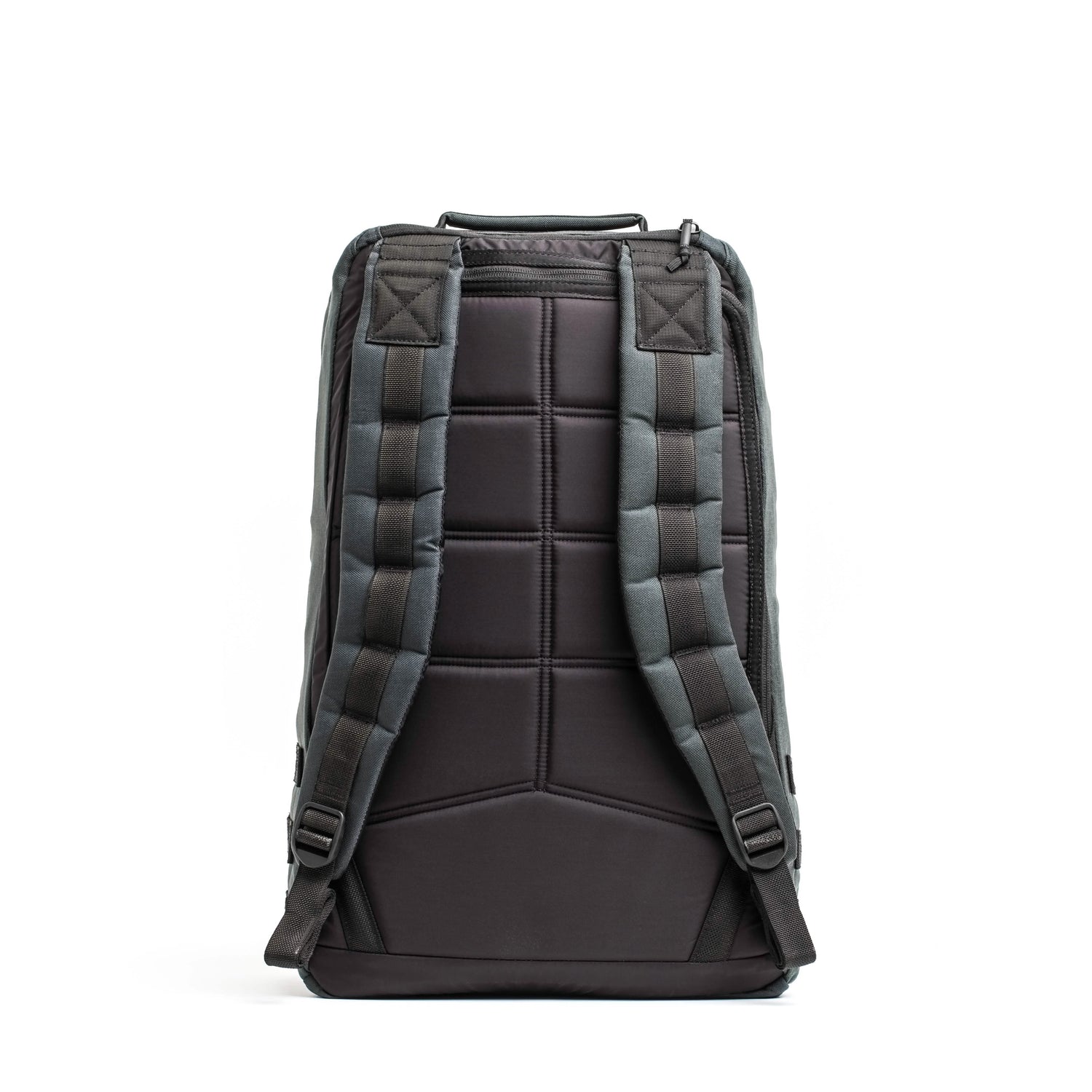 The GR1 USA - Cordura (The Original Ruck) by GORUCK, influenced by Special Forces equipment, boasts padded shoulder straps and a quilted back panel for enhanced comfort. It is shown standing upright against a white backdrop, highlighting its American craftsmanship with a robust and structured design.