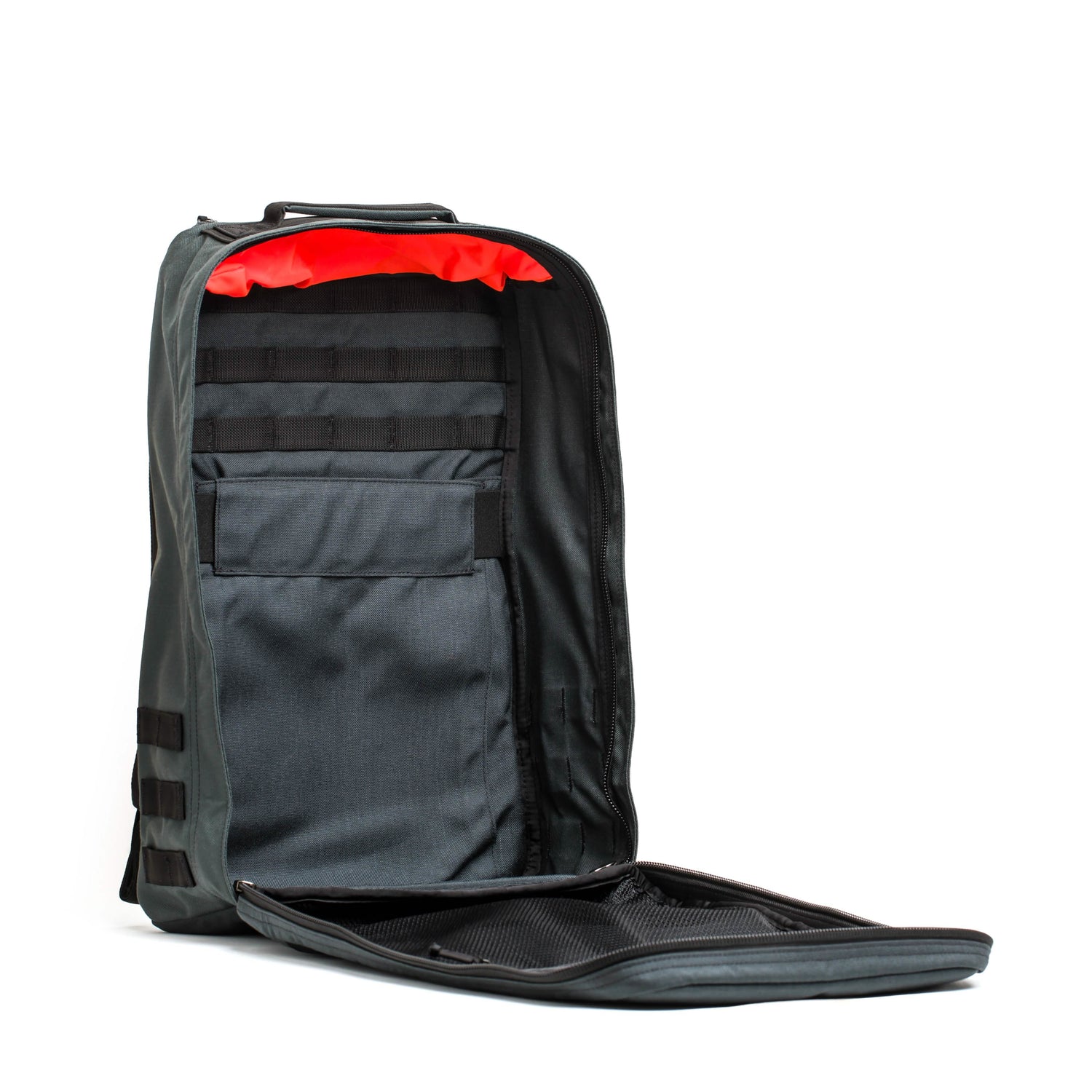 The GR1 USA - Cordura (The Original Ruck) by GORUCK features a sleek design with tough fabric, versatile straps, and a main compartment that opens fully. Designed with the rugged requirements of Special Forces in mind, it includes multiple pockets and striking red interior accents, making it ideal for any GORUCK Challenge.