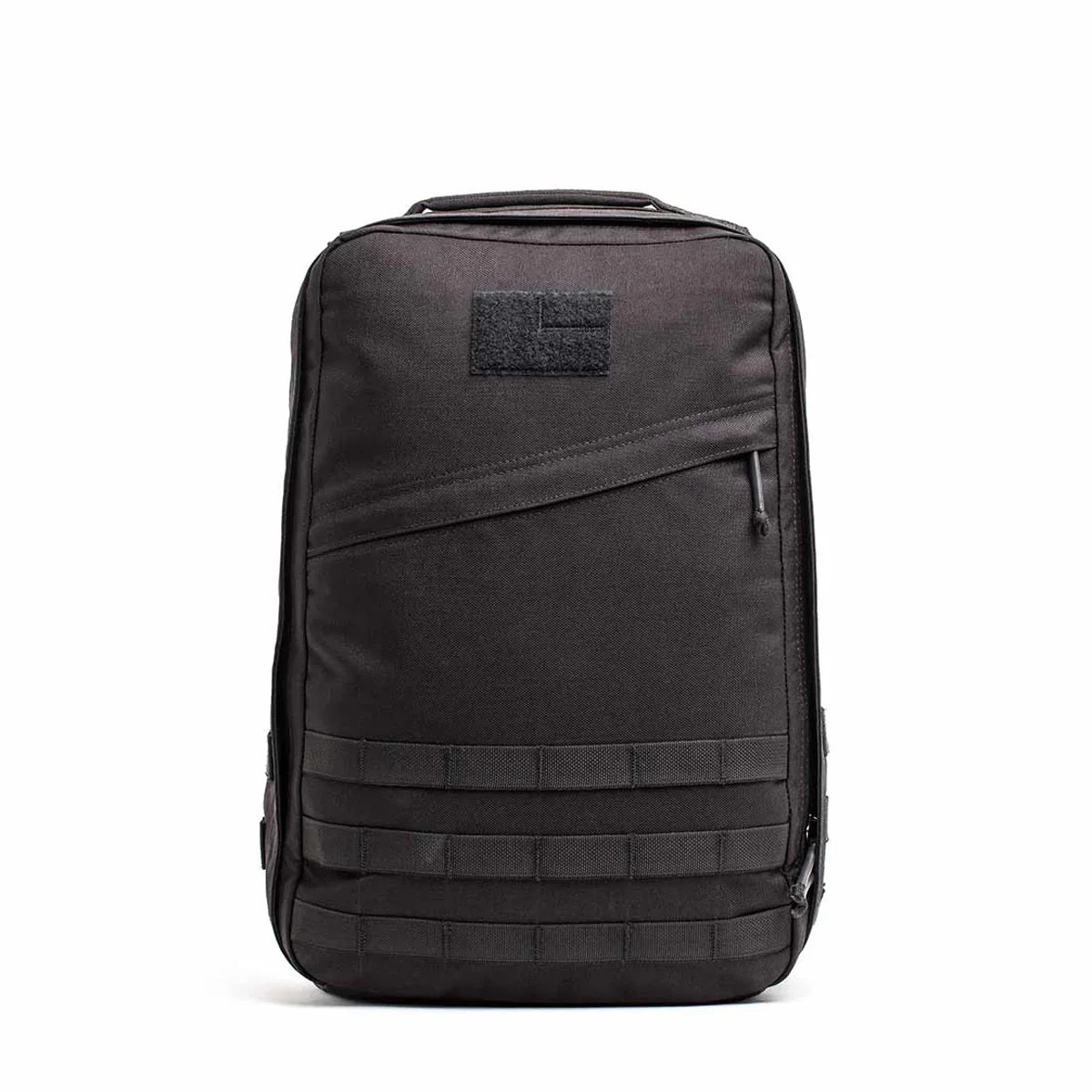 Black GORUCK tactical rucksack with MOLLE webbing and angled zipper pocket, durable rucking gear