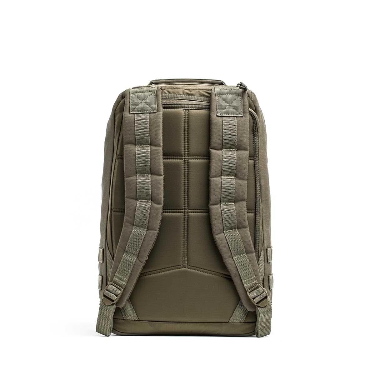 Olive green GR1 USA - Ballistic Nylon Cordura (The Original Ruck) with 210D back panel shown from the back, featuring padded shoulder straps and back panel, perfect as an everyday carry rucksack, displayed on a white background.