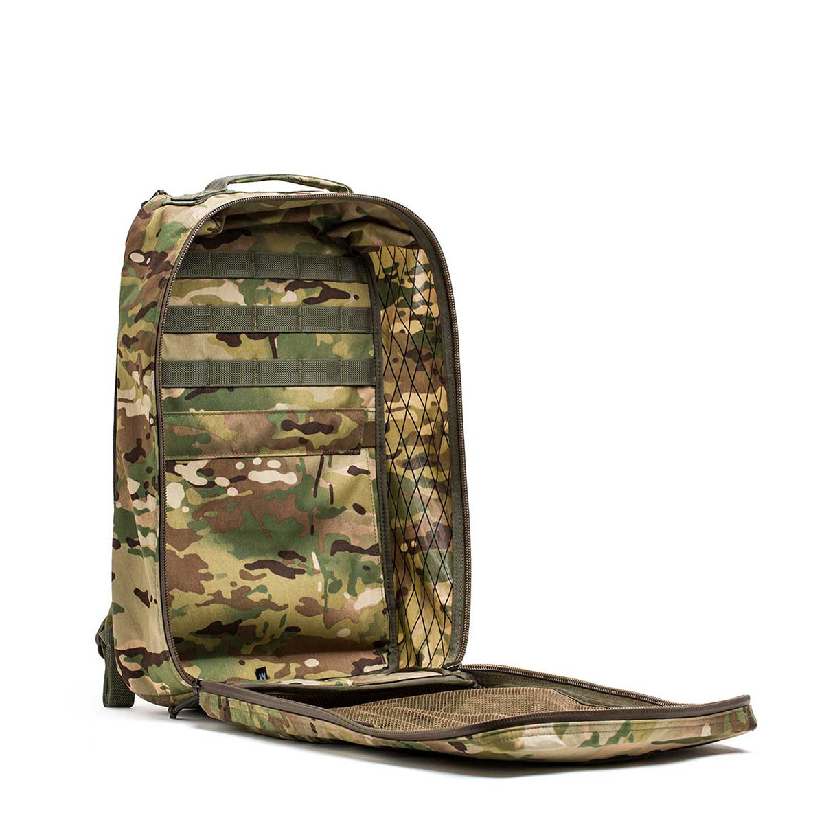 The GR1 USA - X-PAC backpack is open, showing its compartments and mesh pockets on a white background. Designed for durability, it resists the elements with its waterproof features.