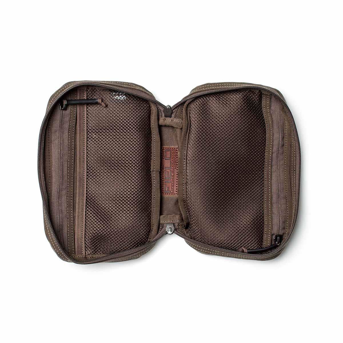 Open GORUCK Field Pocket in Heritage Dark Oak showing dual mesh zippered compartments for organizing rucking gear