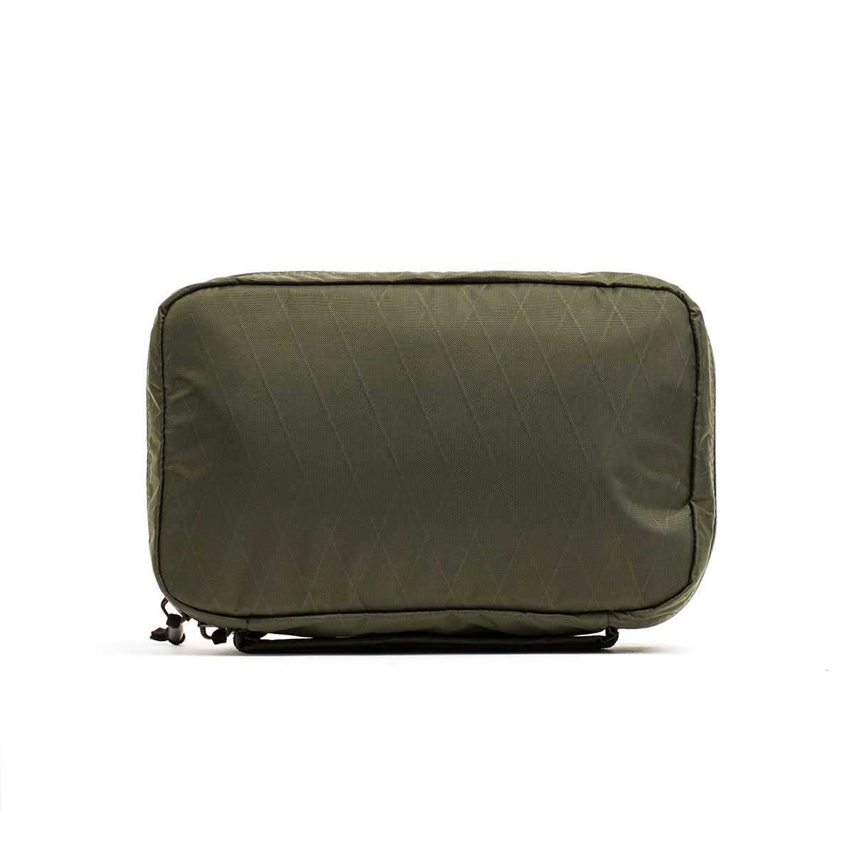 The GR1 Field Pocket - X-PAC is an olive green rectangular pouch made from waterproof X-PAC fabric, featuring a zippered closure—ideal for organizing electronics. Displayed against a plain white background.