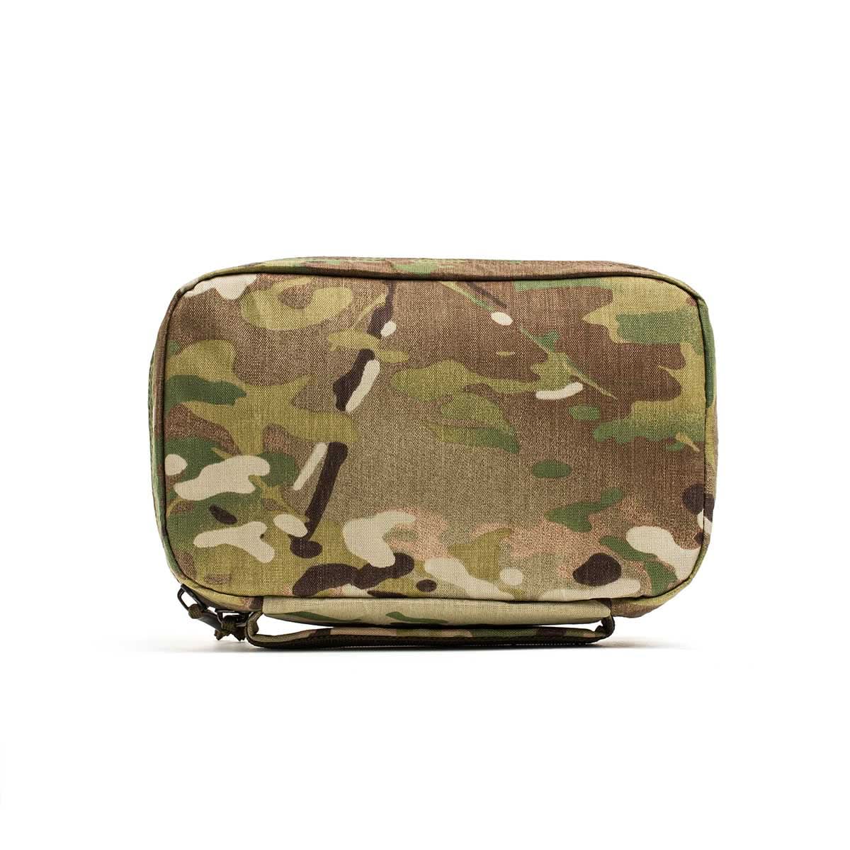 The GR1 Field Pocket - X-PAC is a rectangular camouflage electronics organizer pouch with a zipper and strap, made from waterproof X-PAC fabric, displayed against a white background.