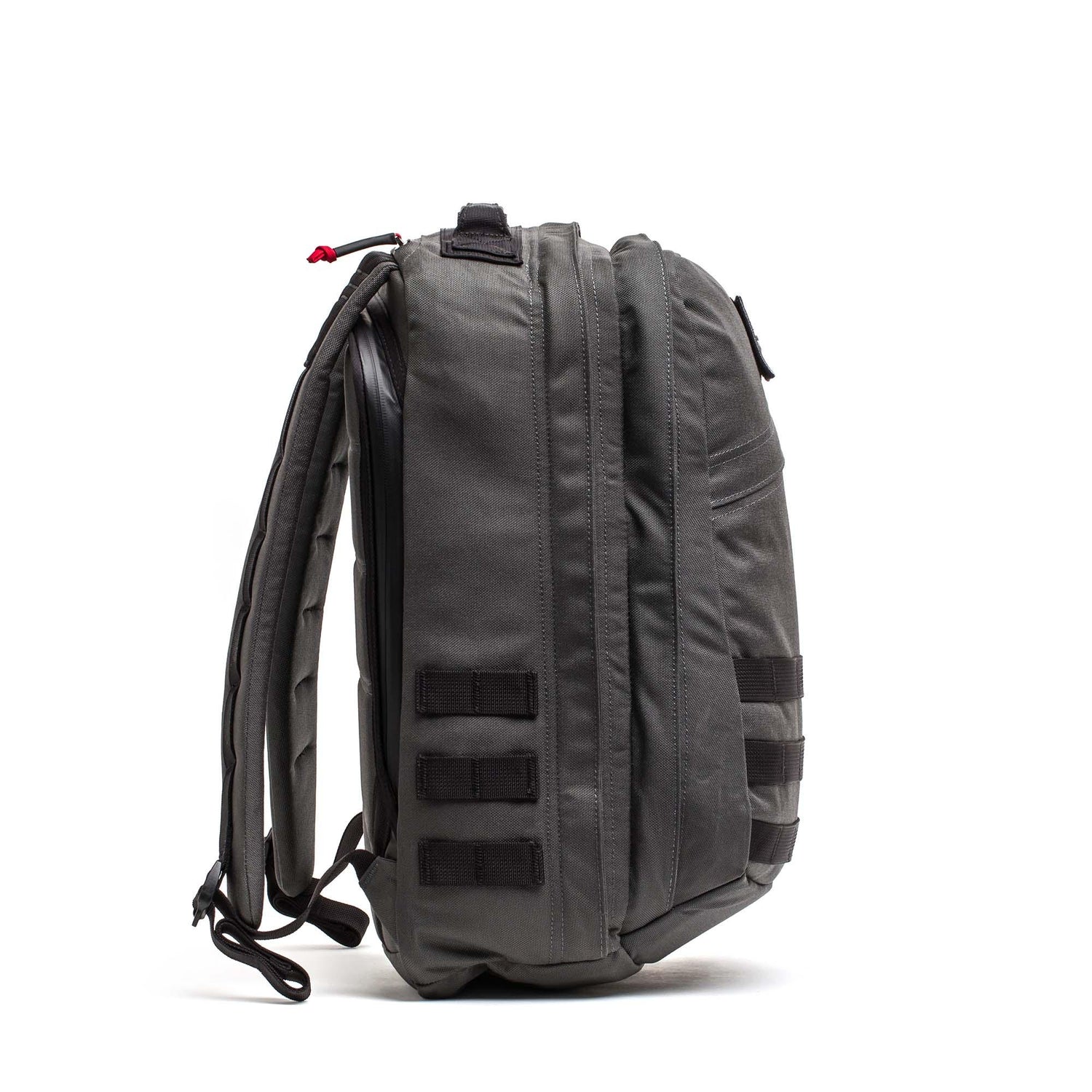 Side view of a gray GR2 - Cordura ruck with padded straps and horizontal webbing loops, perfect as a Special Forces backpack or carry-on travel bag.