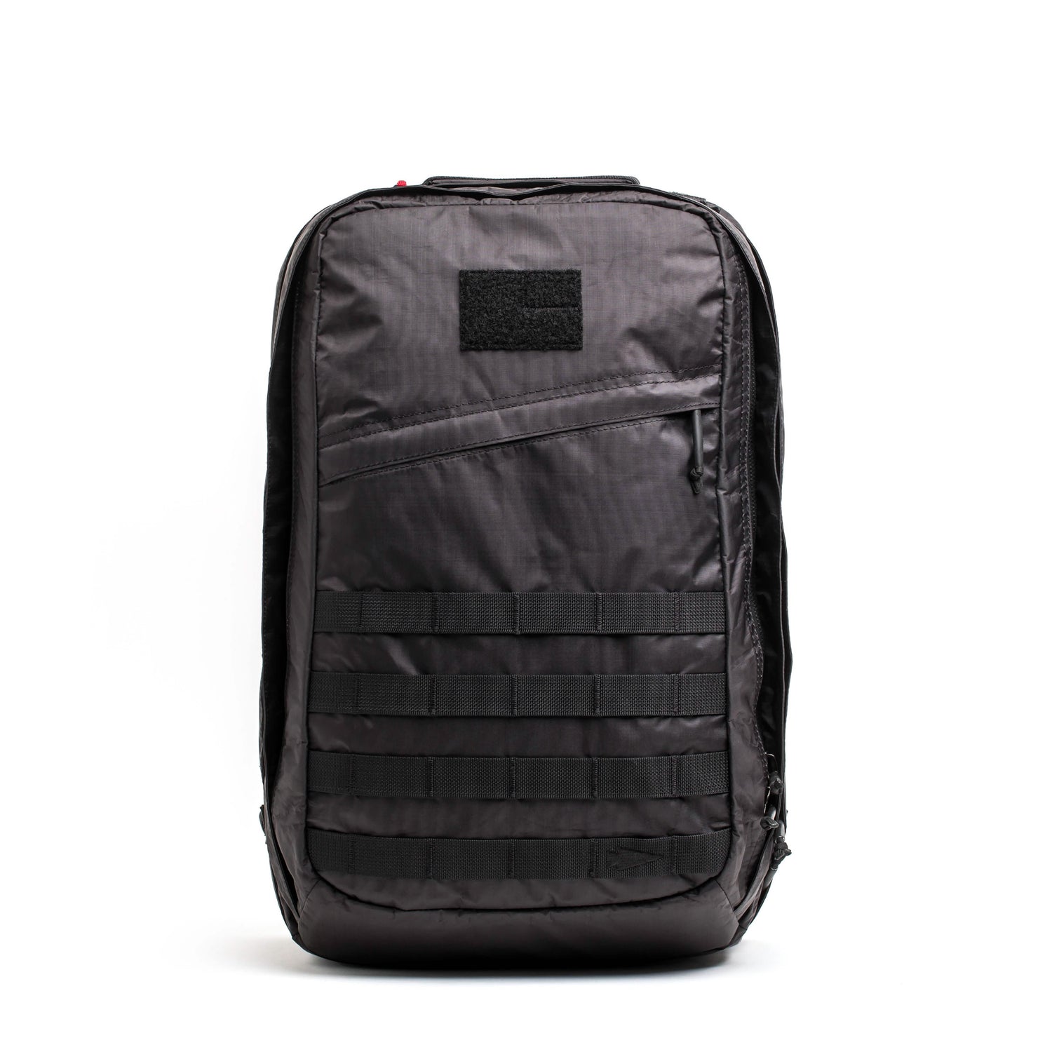 Black GORUCK rucksack with MOLLE webbing and top stash pocket on white background