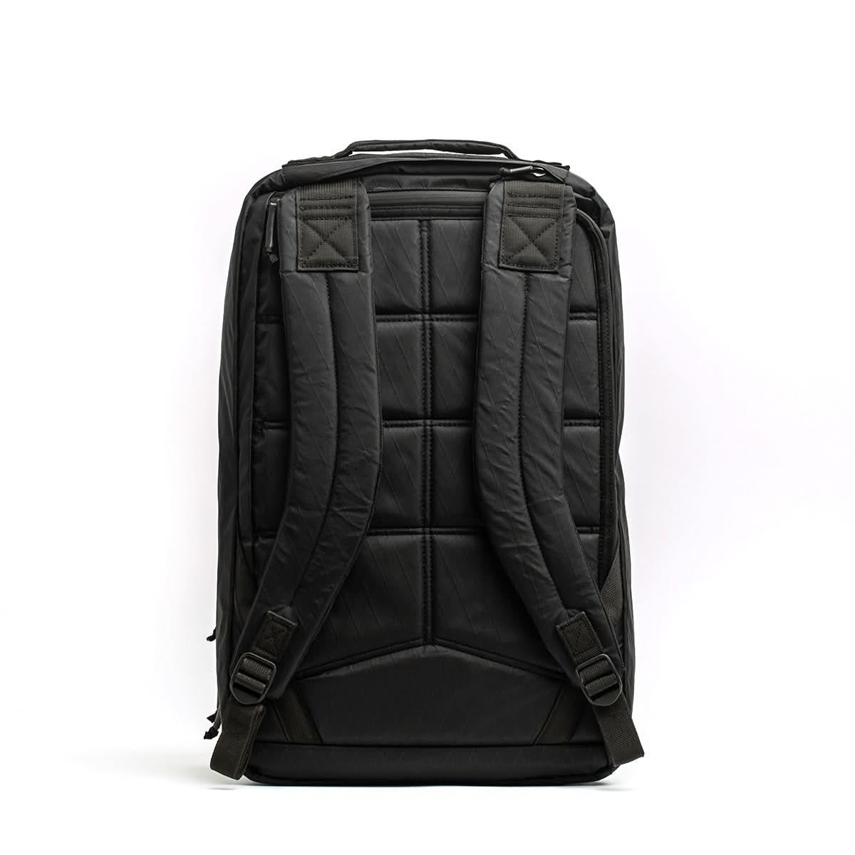 GORUCK black rucksack backpack with padded straps and reinforced back panel on white background